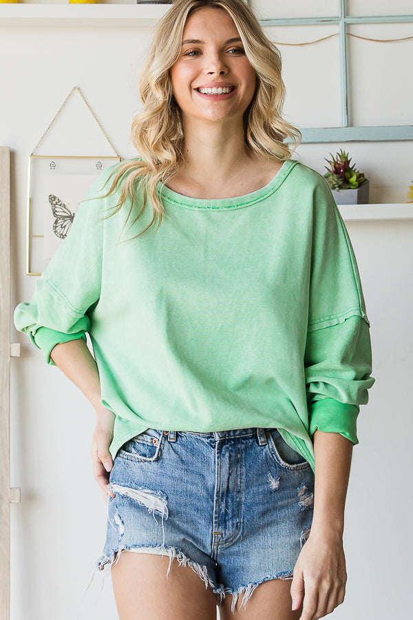 Flirty open back long sleeve top