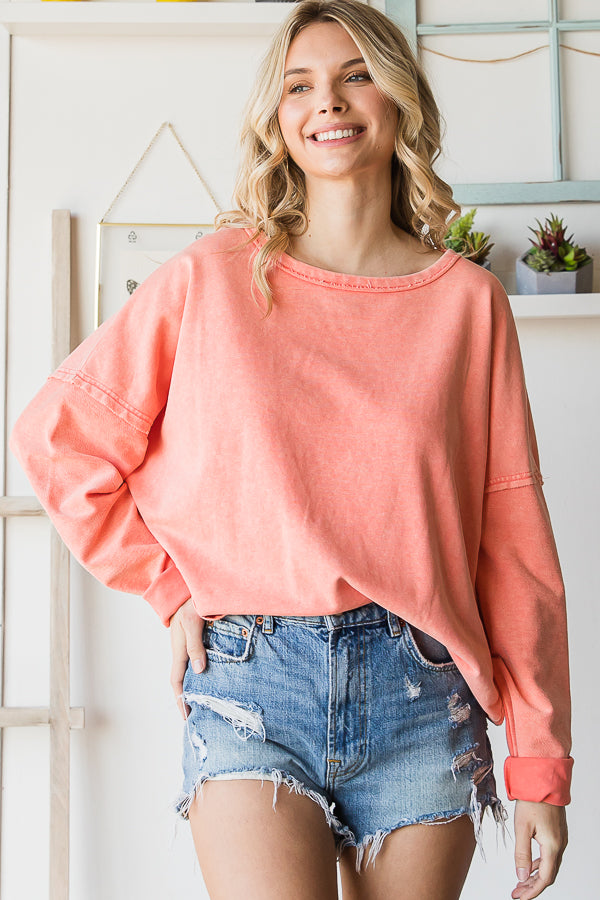 Flirty open back long sleeve top