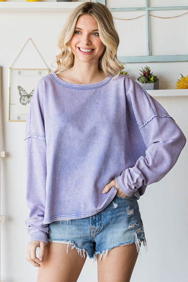 Flirty open back long sleeve top