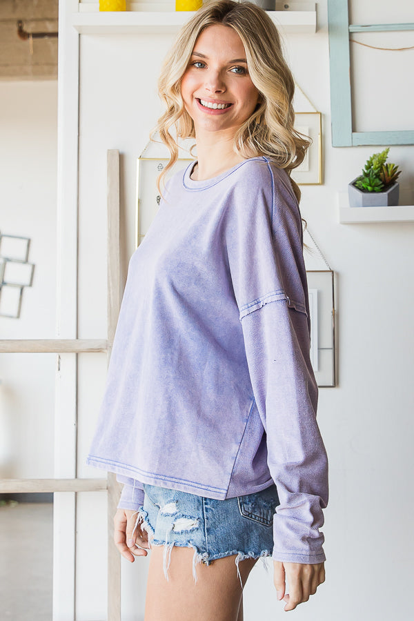 Flirty open back long sleeve top